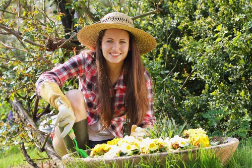 Professional landscaper working on a Wood Green property